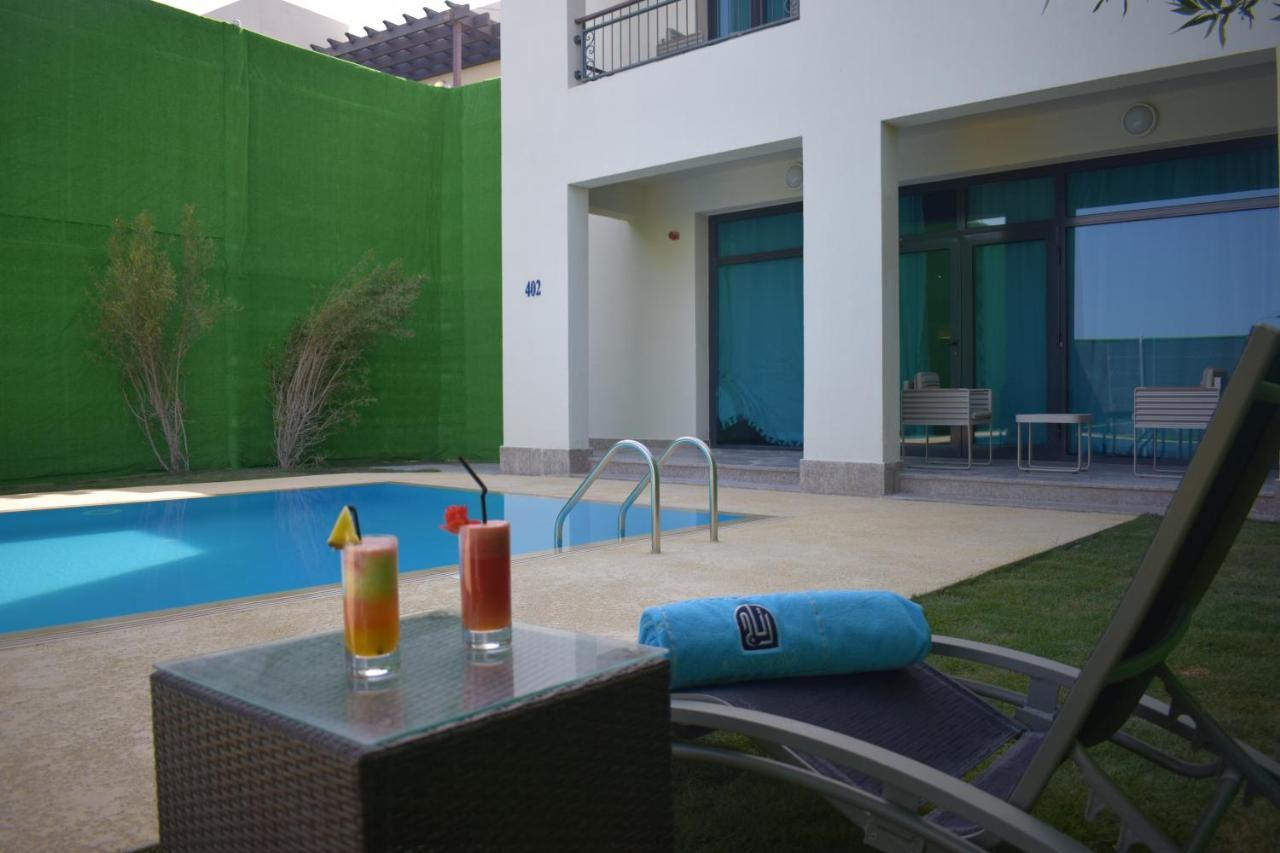 Retaj Salwa Resort & Spa Al Rayyan Exterior foto The swimming pool at the hotel
